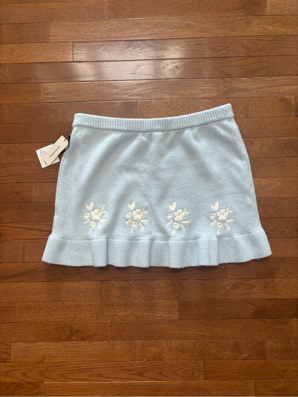 Francesca's Sky Blue Knit Ruffled Mini Skirt with White Floral Embroidery